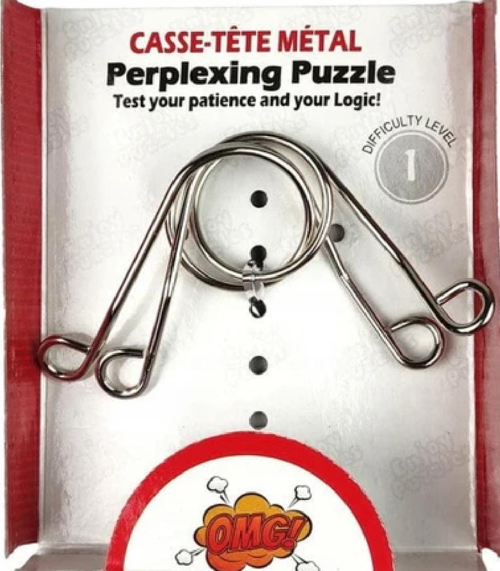 Perplexing Metal Puzzle E525